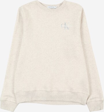 Calvin Klein Jeans Sweatshirt in Bruin: voorkant