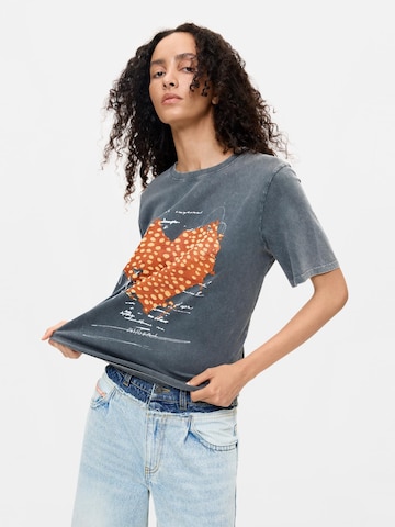 Tricou de la Desigual pe gri