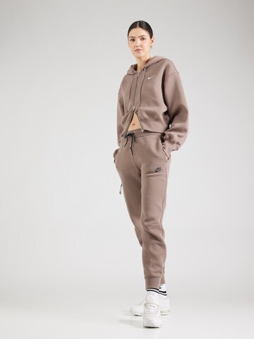 Nike Sportswear Tapered Broek 'TCH FLC' in Bruin
