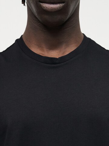 Calvin Klein Jeans Póló '30S' - fekete