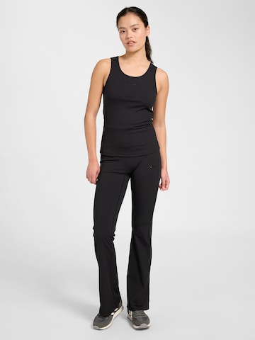 évasé Pantalon de sport Hummel en noir : devant