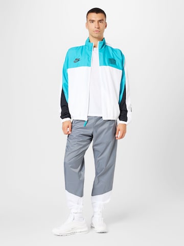 Effilé Pantalon Nike Sportswear en gris