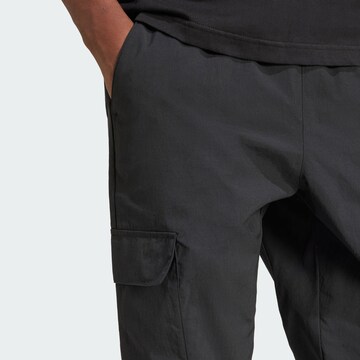 ADIDAS ORIGINALS Tapered Cargo trousers 'Trefoil Essentials' in Black