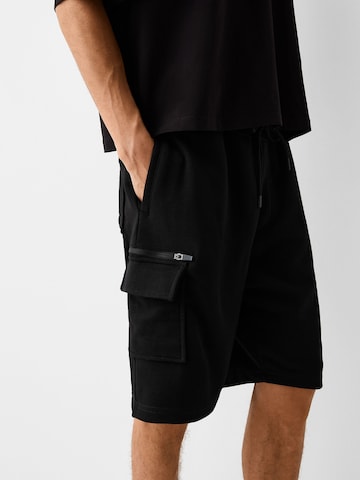 Bershka Loosefit Shorts in Schwarz