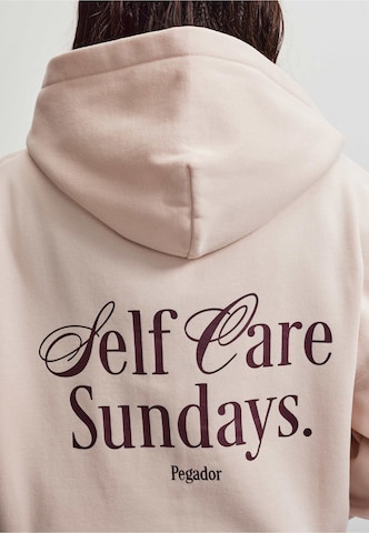 Veste de survêtement 'Deva' Pegador en rose