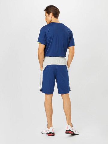 Regular Pantaloni sport de la PUMA pe albastru