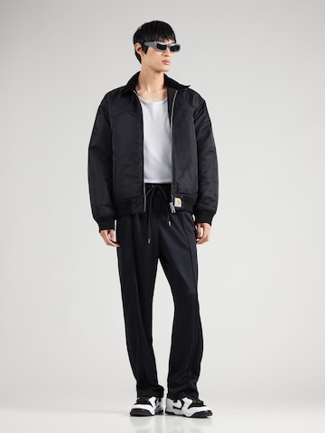 Nike Sportswearregular Hlače 'AIR' - crna boja