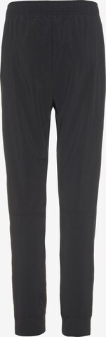 NIKE Regular Workout Pants in Black