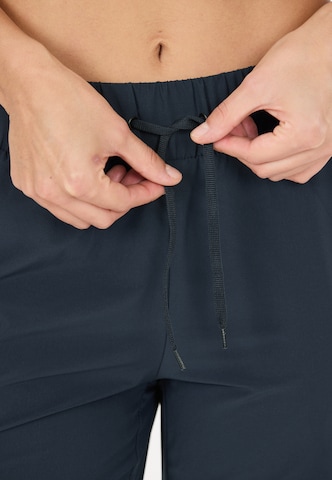 Athlecia Tapered Trainingshose 'Austberg' in Blau