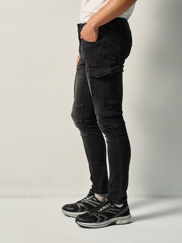 KOROSHI - Skinny Pantalón vaquero cargo en negro