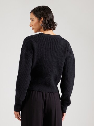 Geacă tricotată 'Cassandra' de la ABOUT YOU pe negru