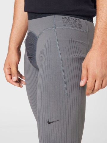 NIKE Skinny Sporthose in Grau