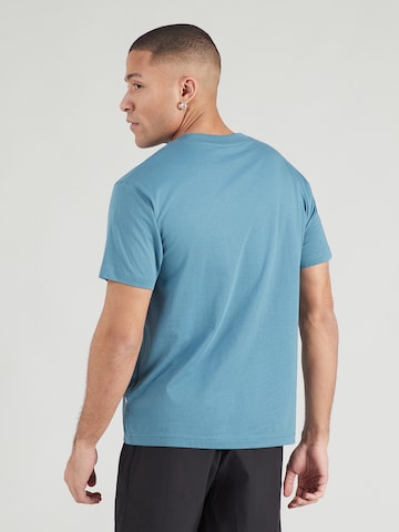 Tricou funcțional de la new balance pe albastru