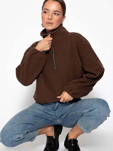 SASSYCLASSY Tröja i brun