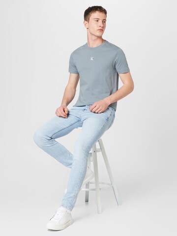 Calvin Klein Jeans Bluser & t-shirts i grå