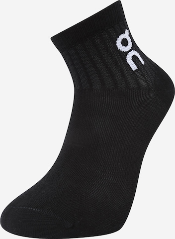 On Sports socks in Black: front