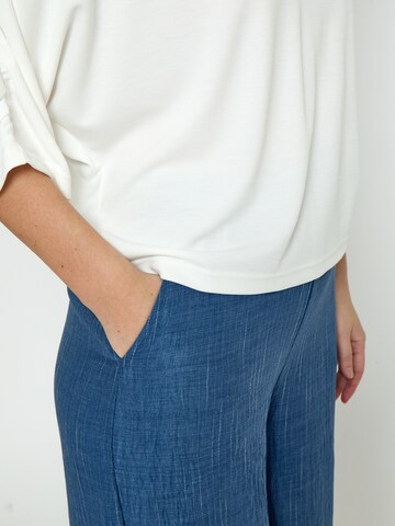 Top 'Triniti' di minus in bianco