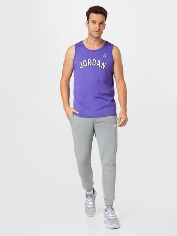 Nike Sportswear Zwężany krój Spodnie 'Club Fleece' w kolorze szary