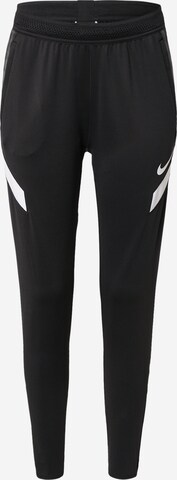 Coupe slim Pantalon de sport NIKE en noir : devant