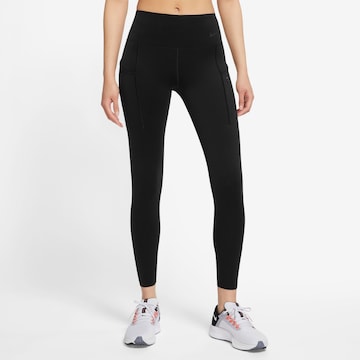 NIKE Skinny Workout Pants in Black: front