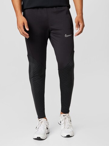 NIKE Regular Workout Pants 'Strike' in Black: front