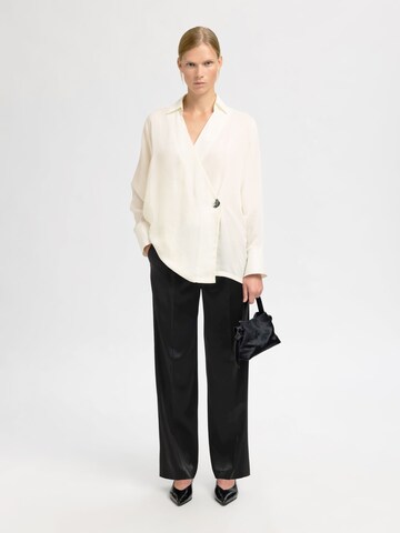 Wide leg Pantaloni con pieghe di SELECTED in nero