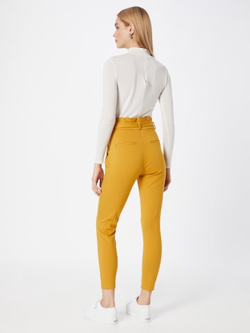 VERO MODA Slim fit Pleat-Front Pants 'Eva' in Yellow
