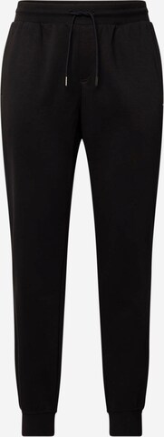 Pantalon TOMMY HILFIGER en noir : devant