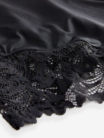 Body modellante di Next in nero