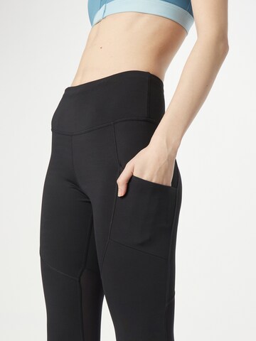 Skinny Pantaloni sportivi di NIKE in nero