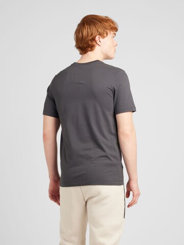 T-Shirt 'SWOOSH' Nike Sportswear en gris