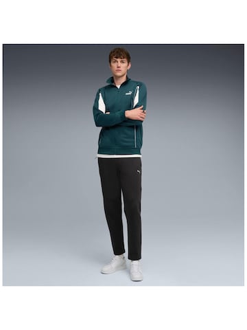 regular Pantaloni sportivi 'Puma Evostripe Pants Dk' di PUMA in nero