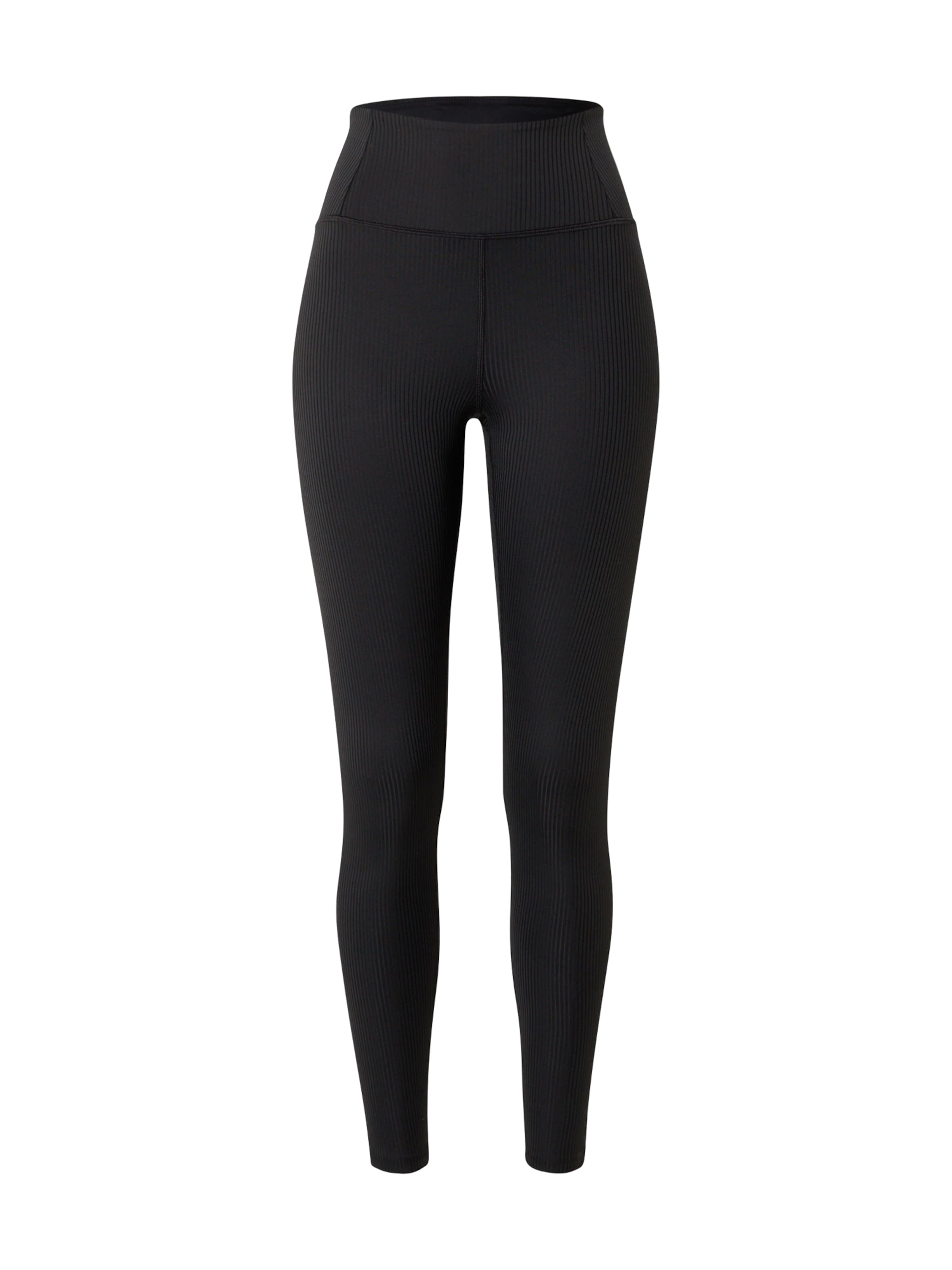 Skinny Pantaloni sport de la Girlfriend Collective pe negru: față