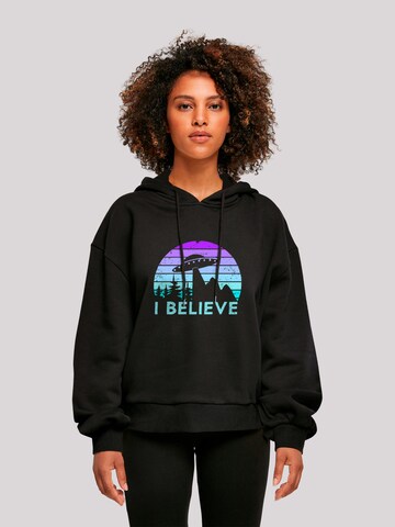 Sweat-shirt 'I Believe UFO Alien Raumschiff Retro' F4NT4STIC en noir : devant