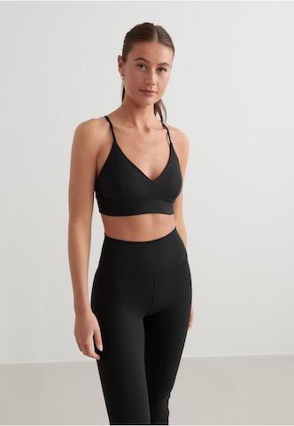 Bustino Reggiseno sportivo di Aim'n in nero