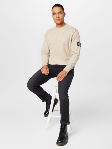 Calvin Klein Jeans Collegepaita värissä beige