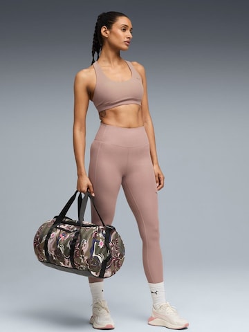 Top sportivo 'Puma Cloudspun Bra - Mid' di PUMA in lilla