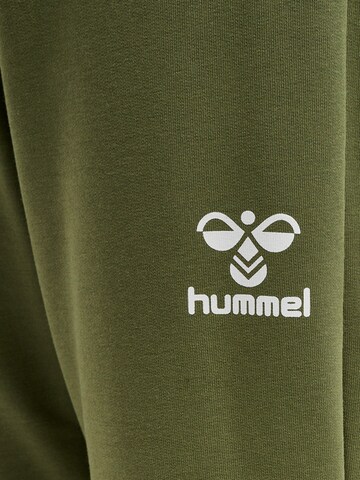 Hummel Regular Sports trousers in Green