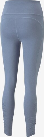 PUMA Skinny Sportbroek 'STUDIO FOUNDATION' in Blauw