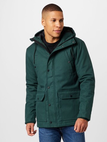 Revolution Between-seasons parka 'Alpine' in Green: front