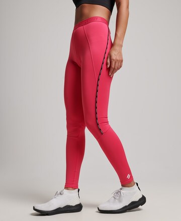 Superdry Skinny Workout Pants in Red: front
