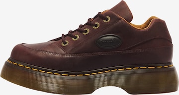 Pantofi cu șireturi 'Buzz' de la Dr. Martens pe roșu: față