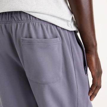 Loosefit Pantaloni 'Athletics French Terry Jogger' di new balance in lilla