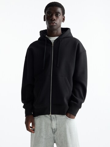 Veste de survêtement Pull&Bear en noir : devant
