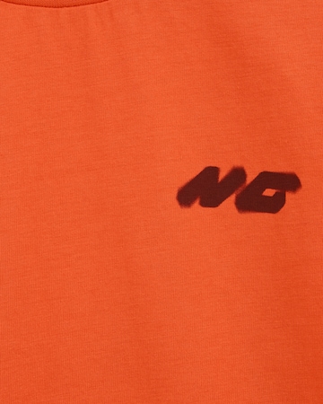 T-Shirt WE Fashion en orange