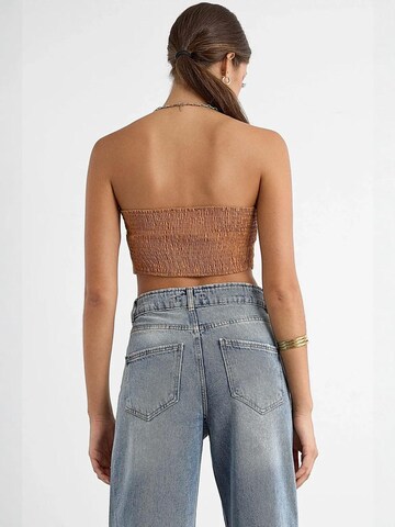 Top di Hiccup in marrone