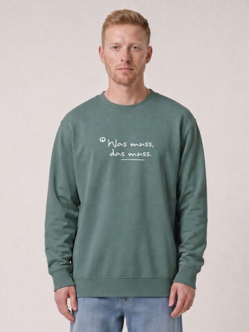 Sweat-shirt ' Was muss das muss ' Watapparel en vert : devant