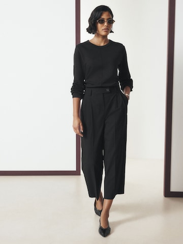 Wide leg Pantaloni con pieghe di Next in nero