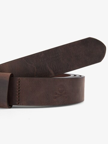 Scalpers Seler ' ' i brun