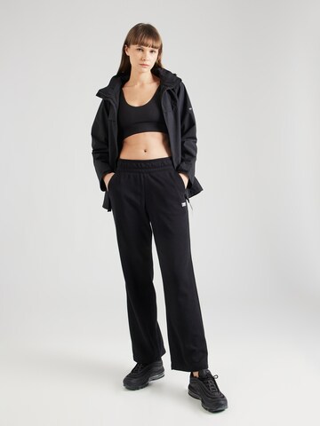 Evazați Pantaloni sport de la DKNY Performance pe negru